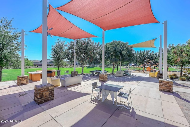 view of patio featuring a playground