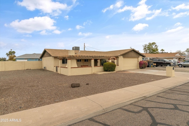 ranch-style house featuring a garage