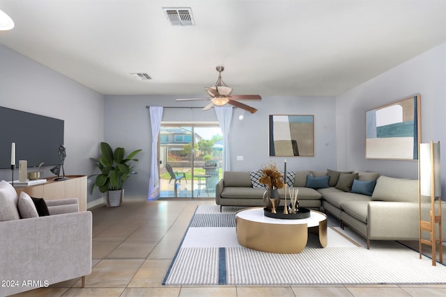 living room with visible vents, ceiling fan, and tile patterned flooring