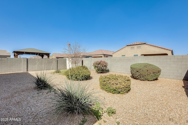 exterior space featuring a fenced backyard