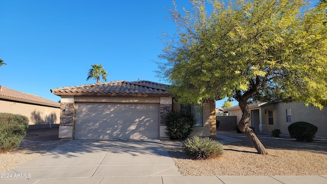 view of front of property featuring a garage