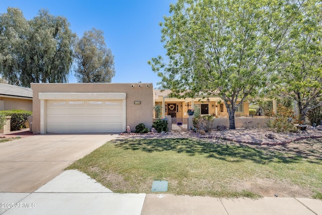 1289 Leisure World, Mesa, AZ 85206 - southwest-style home with a garage, fence private yard, stucco siding, and driveway