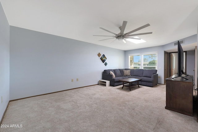 living room with ceiling fan and light carpet