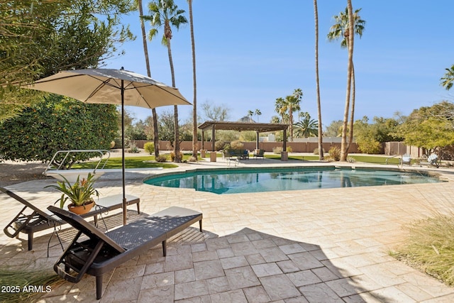 view of swimming pool with a fenced in pool, fence, a gazebo, and a patio