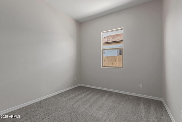 unfurnished room featuring carpet flooring