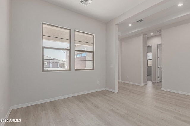 empty room with light wood-type flooring