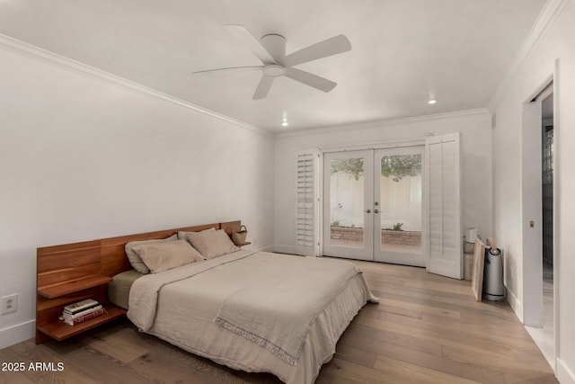106 E Echo Ln, Phoenix, AZ 85020 - bedroom with wood finished floors, access to outside, french doors, and ornamental molding