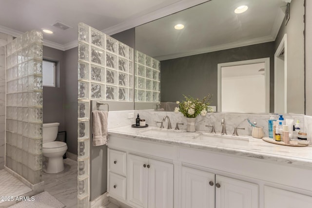 106 E Echo Ln, Phoenix, AZ 85020 - full bath with toilet, visible vents, ornamental molding, and a sink