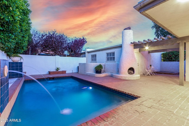 106 E Echo Ln, Phoenix, AZ 85020 - pool at dusk with a patio area, a fenced in pool, and fence