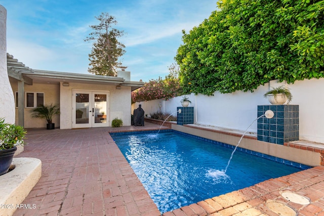 106 E Echo Ln, Phoenix, AZ 85020 - view of pool with a fenced backyard, a patio, french doors, and a fenced in pool