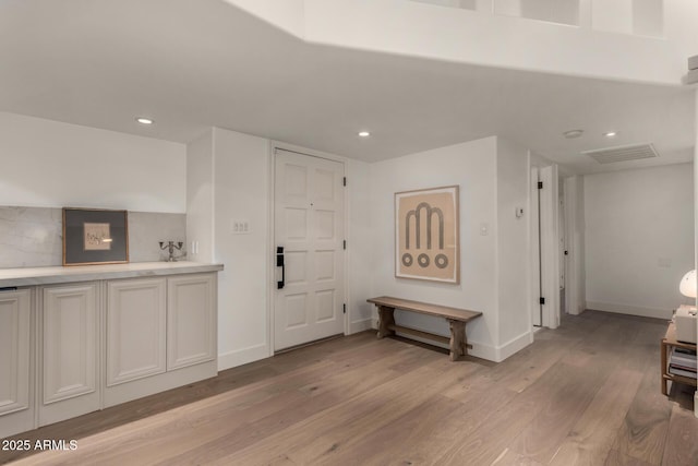 106 E Echo Ln, Phoenix, AZ 85020 - foyer entrance with baseboards, recessed lighting, light wood finished floors, and visible vents