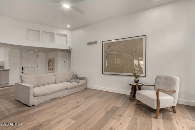 106 E Echo Ln, Phoenix, AZ 85020 - living room featuring a ceiling fan, light wood-type flooring, visible vents, baseboards, and recessed lighting