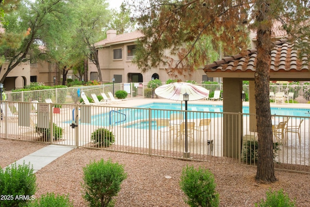 community pool with fence