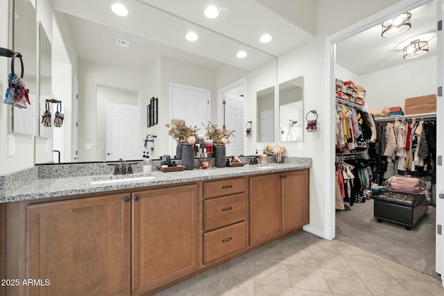 bathroom featuring vanity and tile patterned flooring