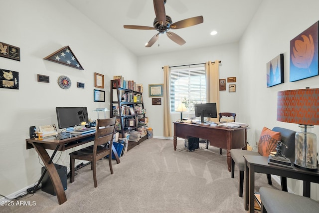 office with light carpet and ceiling fan