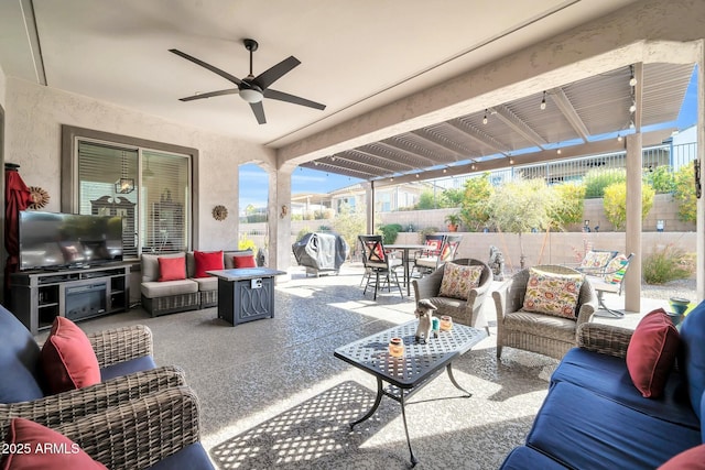 view of patio / terrace featuring an outdoor living space and ceiling fan