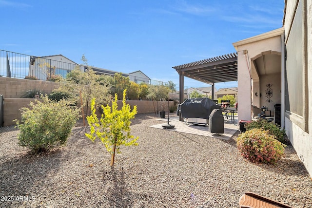 view of yard featuring a patio and a pergola