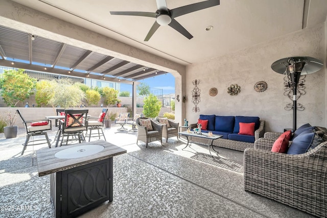 view of patio / terrace with ceiling fan and an outdoor hangout area