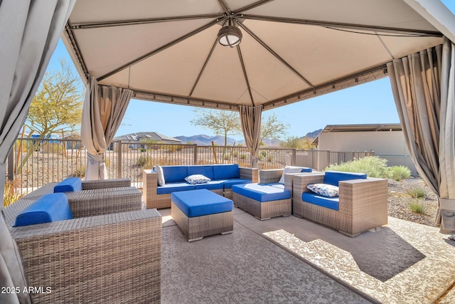 view of patio featuring a gazebo and outdoor lounge area