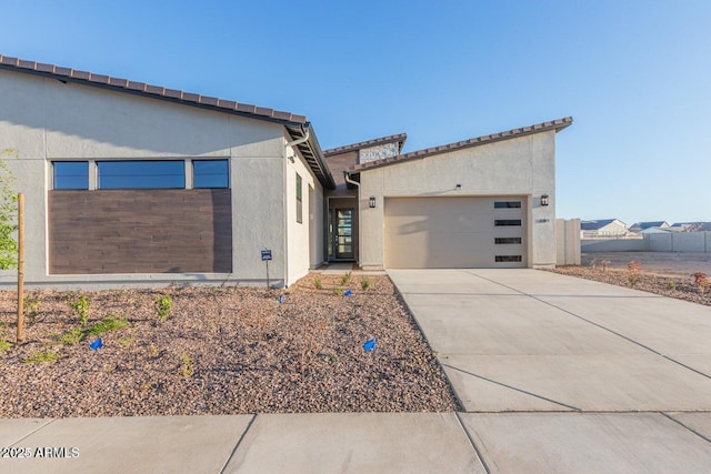 view of front of home with a garage