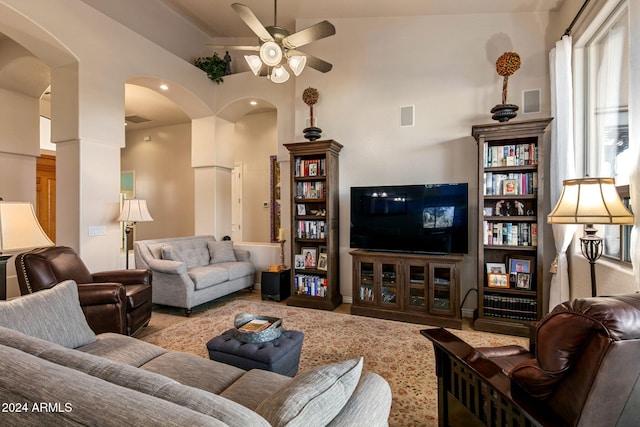 living room featuring ceiling fan