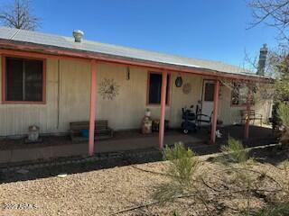 back of house featuring a patio area