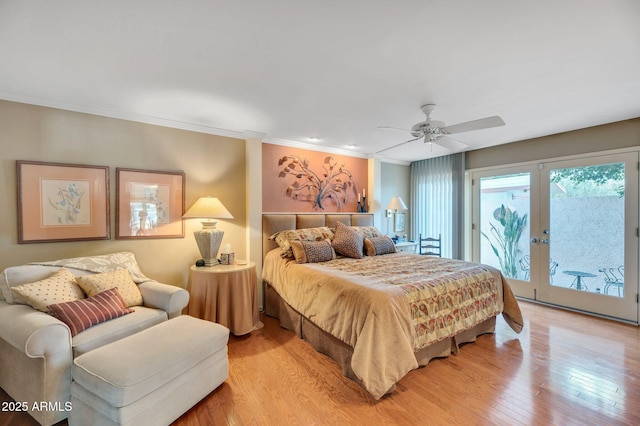 bedroom with access to outside, french doors, ceiling fan, light hardwood / wood-style floors, and crown molding