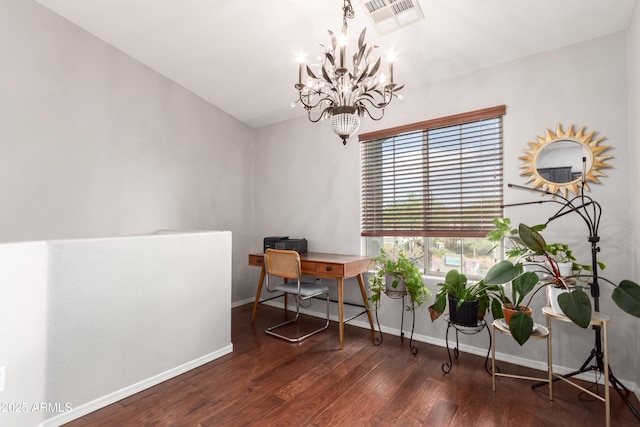 interior space featuring baseboards, a notable chandelier, wood finished floors, and visible vents