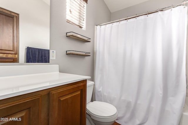 full bath featuring toilet and vanity