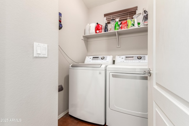 laundry area with laundry area and washing machine and clothes dryer