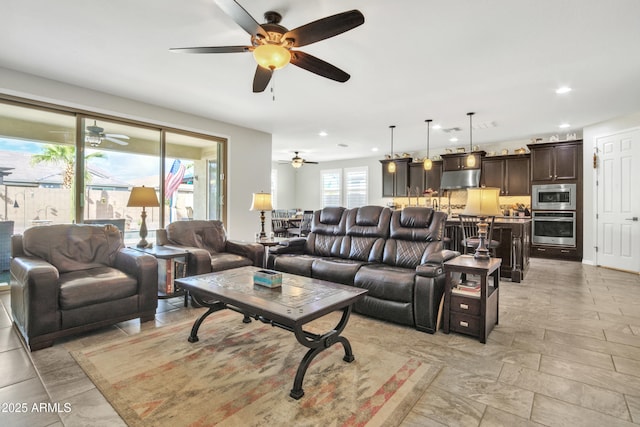 living area featuring recessed lighting