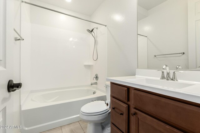 full bathroom with tile patterned flooring, toilet, bathing tub / shower combination, and vanity