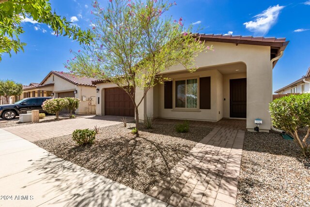 view of front of home with a garage