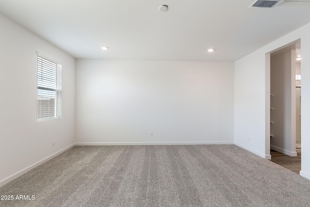 view of carpeted spare room