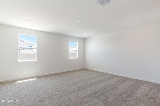 empty room featuring carpet flooring