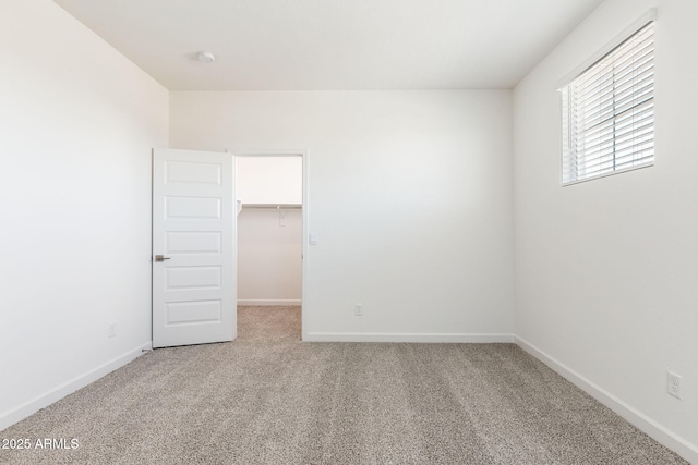 spare room with carpet flooring