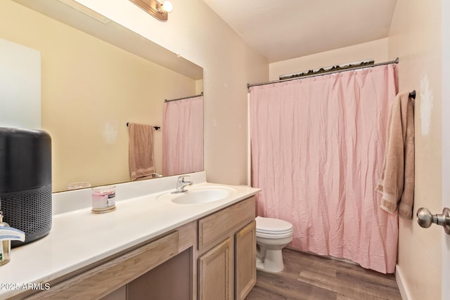 12517 W Santa Fe Ln, El Mirage, AZ 85335 - full bath with toilet, vanity, and wood finished floors