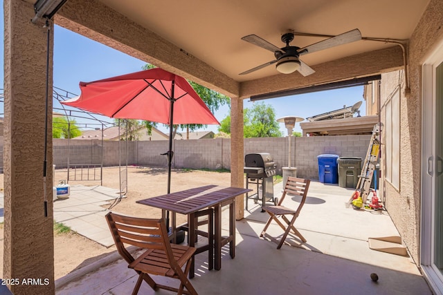 12517 W Santa Fe Ln, El Mirage, AZ 85335 - view of patio / terrace featuring grilling area, a fenced backyard, and ceiling fan