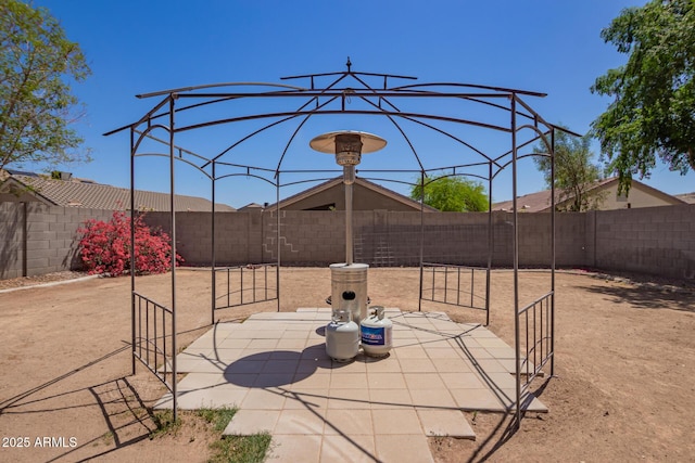 12517 W Santa Fe Ln, El Mirage, AZ 85335 - view of patio / terrace featuring a fenced backyard