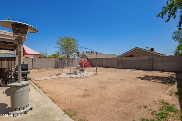 12517 W Santa Fe Ln, El Mirage, AZ 85335 - view of yard with a patio and a fenced backyard