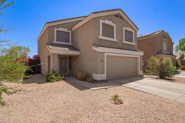 12517 W Santa Fe Ln, El Mirage, AZ 85335 - traditional-style home featuring stucco siding, an attached garage, concrete driveway, and a tiled roof