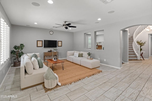 3603 E Salter Dr, Phoenix, AZ 85050 - living room with baseboards, recessed lighting, a ceiling fan, and stairway