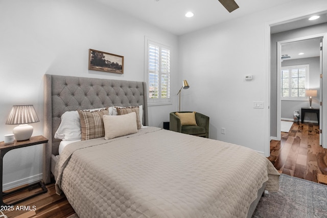 3603 E Salter Dr, Phoenix, AZ 85050 - bedroom featuring recessed lighting, wood finished floors, and baseboards