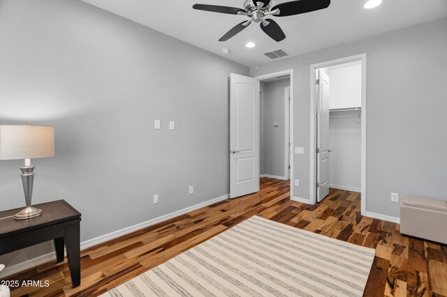 3603 E Salter Dr, Phoenix, AZ 85050 - unfurnished bedroom with recessed lighting, a ceiling fan, visible vents, baseboards, and wood finished floors