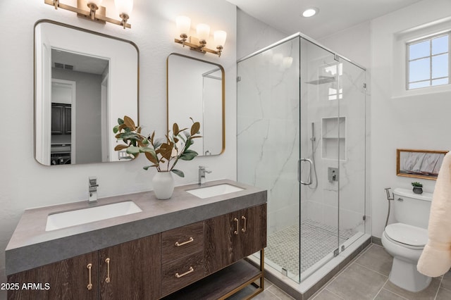 3603 E Salter Dr, Phoenix, AZ 85050 - full bathroom with toilet, a sink, a shower stall, and visible vents
