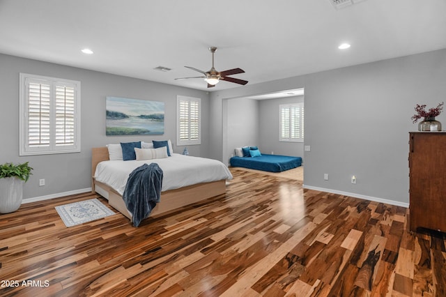 3603 E Salter Dr, Phoenix, AZ 85050 - bedroom featuring wood finished floors, recessed lighting, visible vents, and baseboards