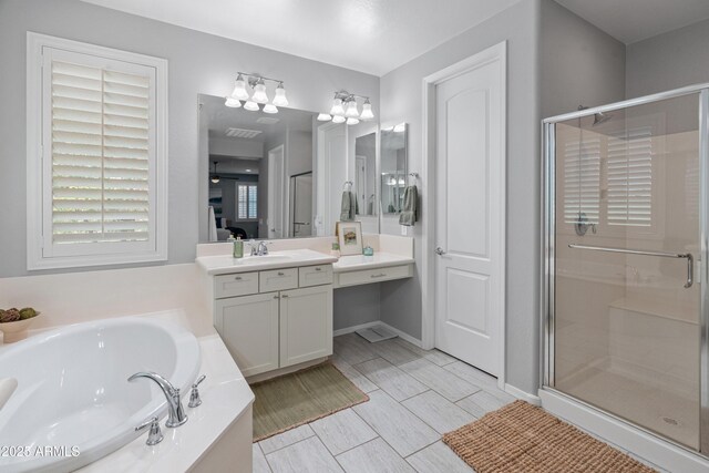 3603 E Salter Dr, Phoenix, AZ 85050 - bathroom with a garden tub, a stall shower, visible vents, and vanity