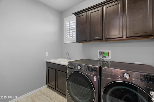3603 E Salter Dr, Phoenix, AZ 85050 - clothes washing area with baseboards, washing machine and dryer, cabinet space, and a sink