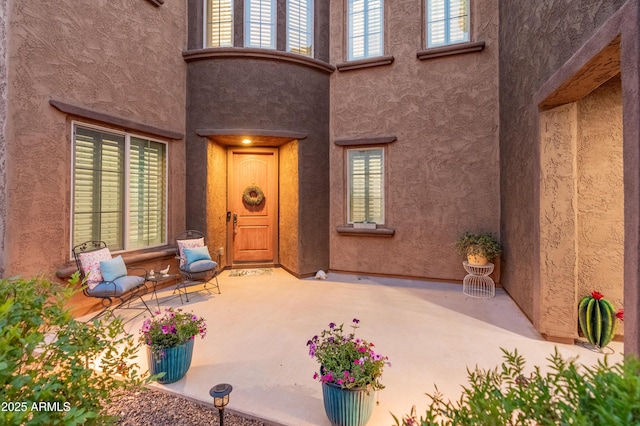 3603 E Salter Dr, Phoenix, AZ 85050 - doorway to property with a patio and stucco siding
