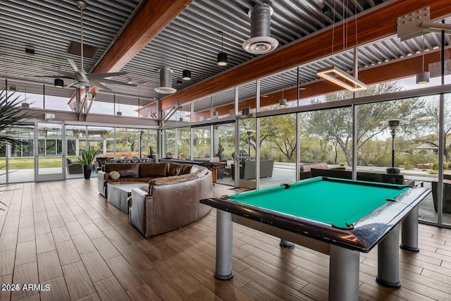 3603 E Salter Dr, Phoenix, AZ 85050 - playroom featuring a wall of windows, wood finished floors, and pool table